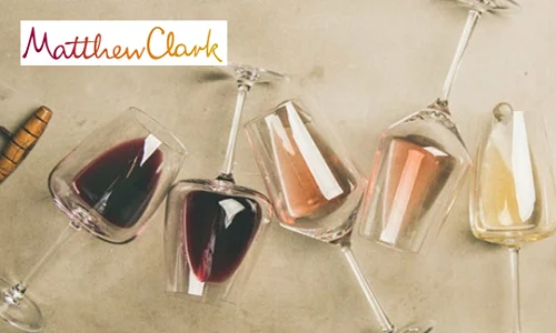 http://Wine%20glasses%20on%20their%20sides%20with,%20rose,%20white%20&%20red%20wine%20in%20them