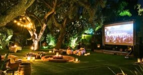 Make the most of your outdoor screen by hosting 'drive-in' style movie nights